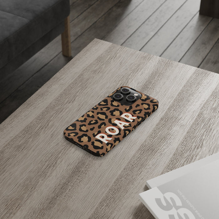 Slim iPhone Case with Leopard Print Design: tan, black leopard print, bold graphic animal print style