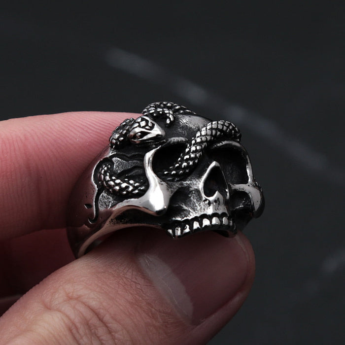 Snake-Embellished Skull Ring: silver, black human skull with snake, gothic style