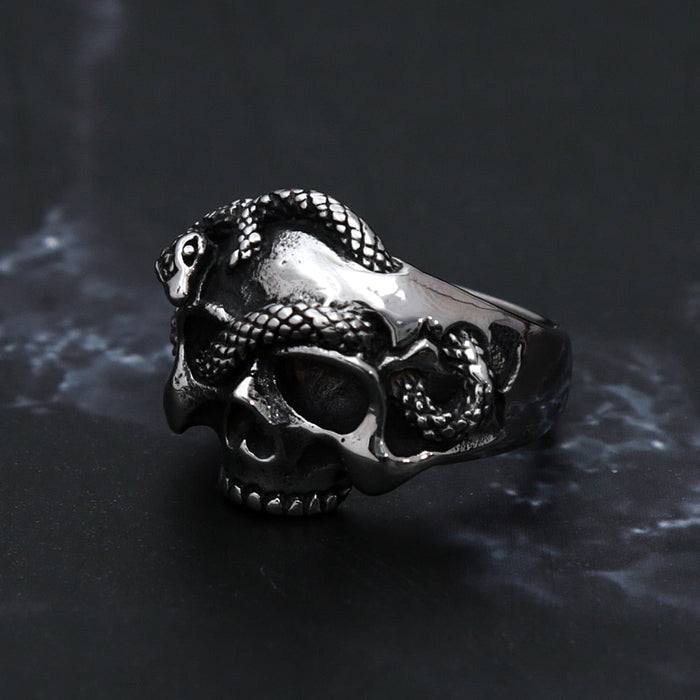 Snake-Embellished Skull Ring: silver, black human skull with snake, gothic style