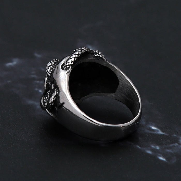 Snake-Embellished Skull Ring: silver, black human skull with snake, gothic style