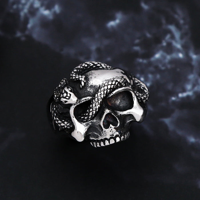 Snake-Embellished Skull Ring: silver, black human skull with snake, gothic style
