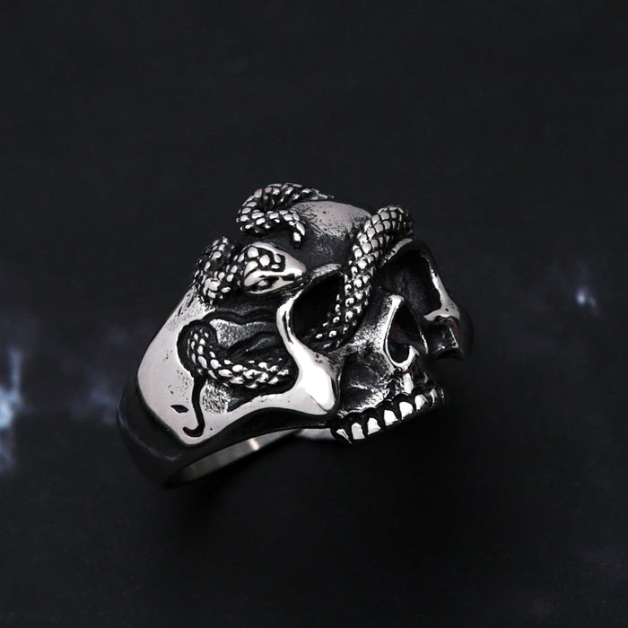 Snake-Embellished Skull Ring: silver, black human skull with snake, gothic style