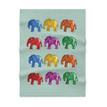 Soft Fleece Baby Blanket with Elephant-Shaped Gummies: pale mint green, blue elephants, cartoon style