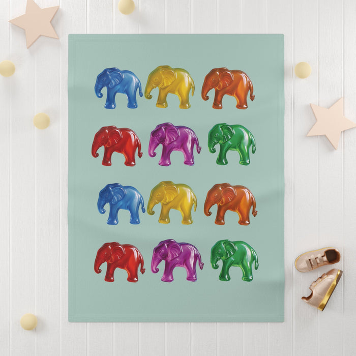Soft Fleece Baby Blanket with Elephant-Shaped Gummies: pale mint green, blue elephants, cartoon style