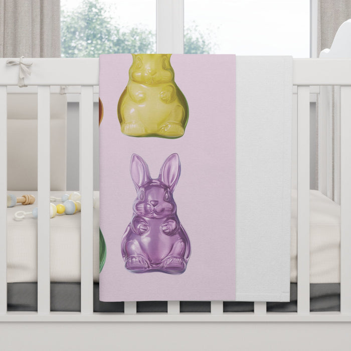 Soft Pink Fleece Baby Blanket with Bunny-Shaped Gummies: pale pink, red rabbits, cartoon-like glossy figurine illustration st