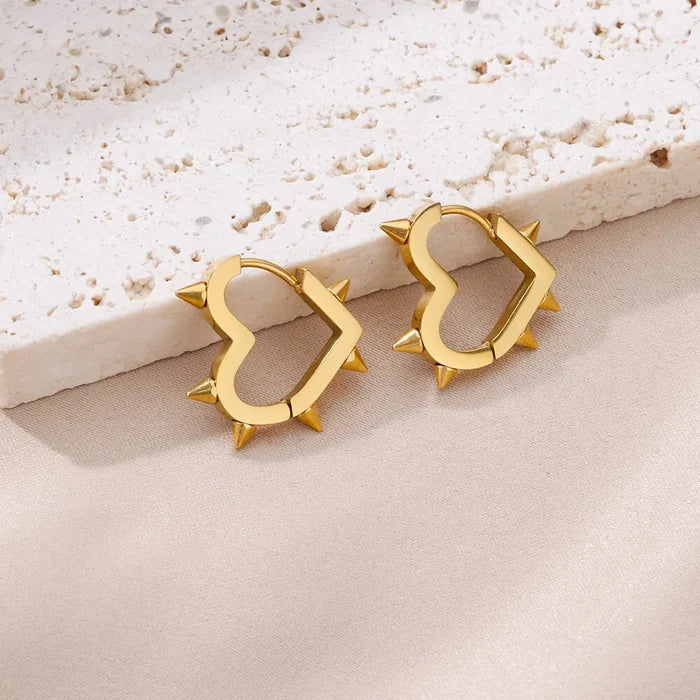 Spike-embellished Heart-Shaped Hoop Earrings: silver pair of hoop earrings, punk, edgy style
