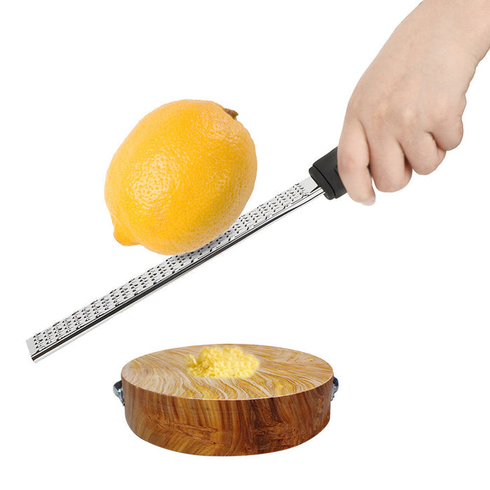 Stainless Steel Multi-Purpose Fruit and Cheese Peeler: silver, black handheld grater/zester, minimal kitchen utensil product