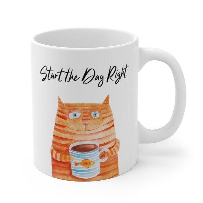 Start Your Day Off Right with the Cat Holding Goldfish Coffee Tea Mug: white, orange orange tabby cat holding a cup, cartoon