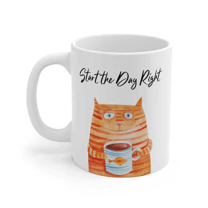 Start Your Day Off Right with the Cat Holding Goldfish Coffee Tea Mug: white, orange orange tabby cat holding a cup, cartoon