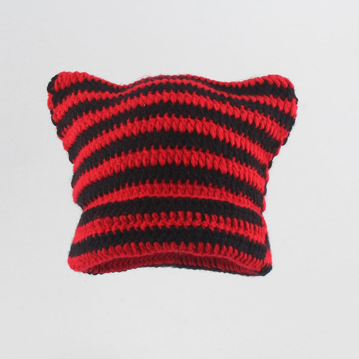 Striped Knitted Beanie for Adults: black, white cat-like character, minimal cartoon style