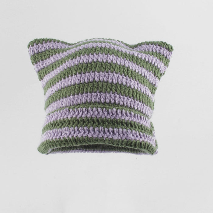 Striped Knitted Beanie for Adults: black, white cat-like character, minimal cartoon style
