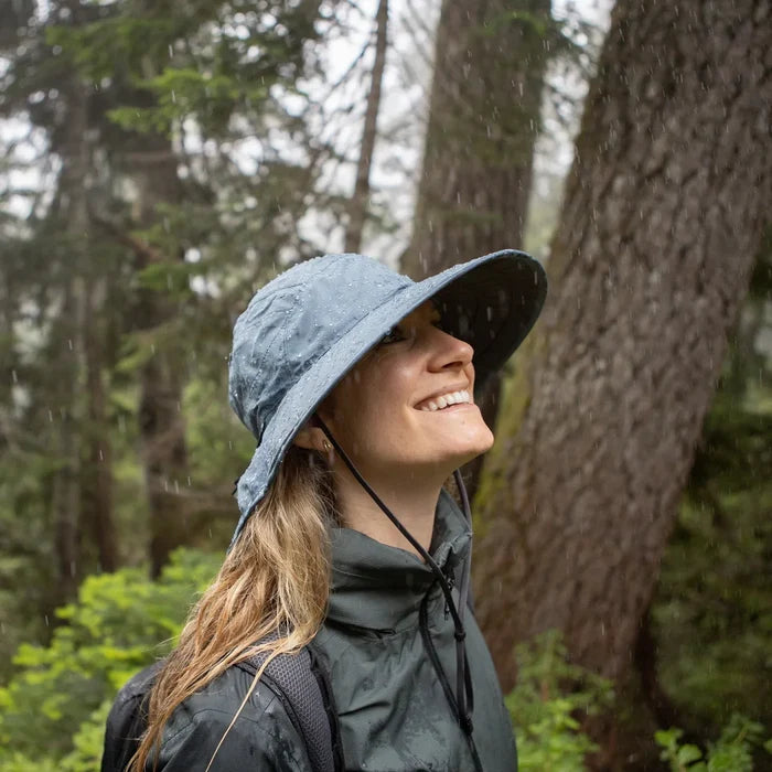 A Sunday Afternoons Ultra Adventure Storm Hat being worn outdoors