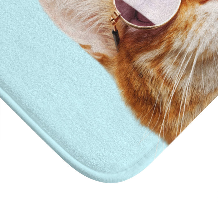 Sunglasses-Wearing Cat Bath Mat: light blue, orange orange-and-white cat, cute cartoon-like photo print style