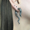 Tentacular Earrings: silver, dark gray octopus tentacle, realistic gothic style