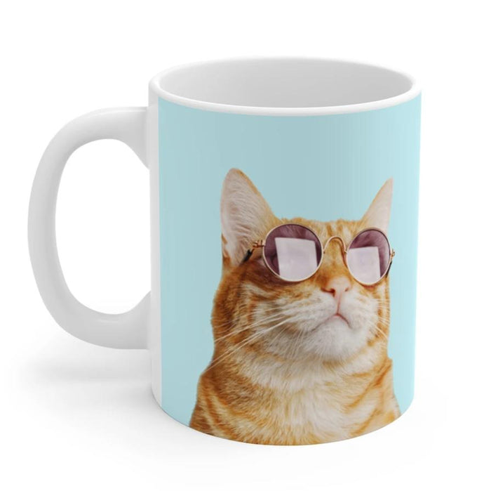 The Purrfect Mug for Cat Lovers: white, light blue orange tabby cat wearing sunglasses, playful photo print style