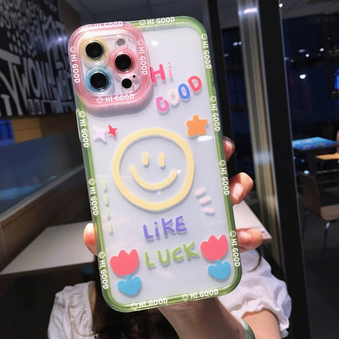 Transparent iPhone Cover with Smiling Emoji Face: clear, blue smiley-face theme, kawaii cartoon style