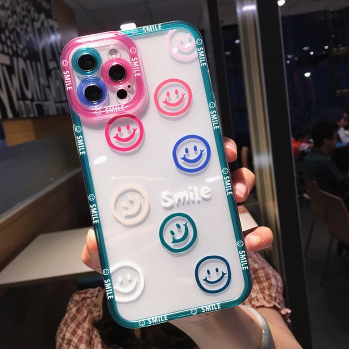 Transparent iPhone Cover with Smiling Emoji Face: clear, blue smiley-face theme, kawaii cartoon style