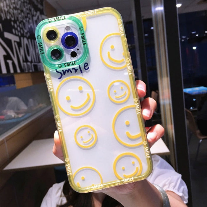 Transparent iPhone Cover with Smiling Emoji Face: clear, blue smiley-face theme, kawaii cartoon style