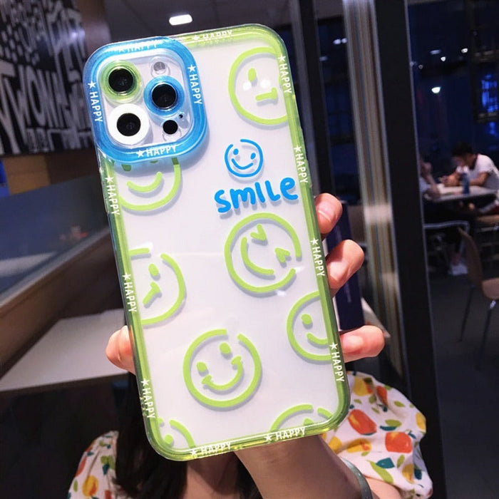 Transparent iPhone Cover with Smiling Emoji Face: clear, blue smiley-face theme, kawaii cartoon style