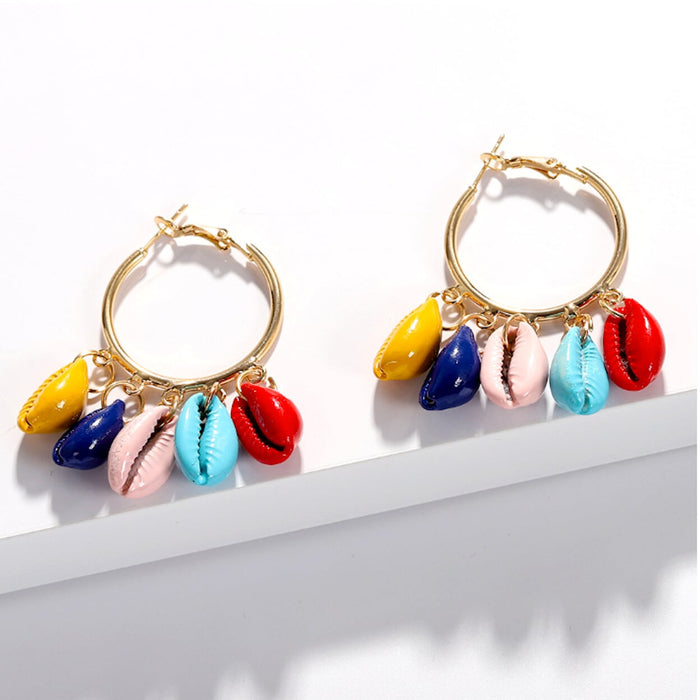 Vibrant Shell Circle Earrings: gold, yellow cowrie shell theme, colorful bohemian beach-inspired style