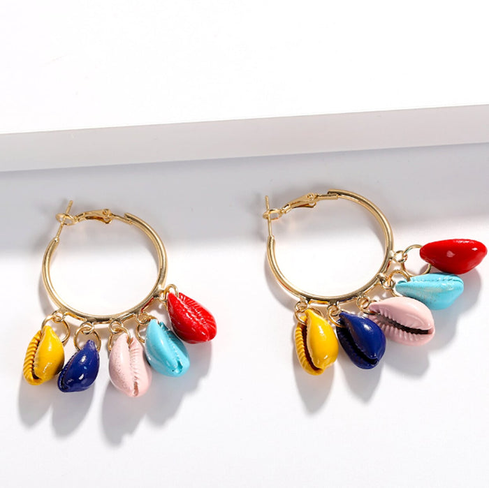 Vibrant Shell Circle Earrings: gold, yellow cowrie shell theme, colorful bohemian beach-inspired style