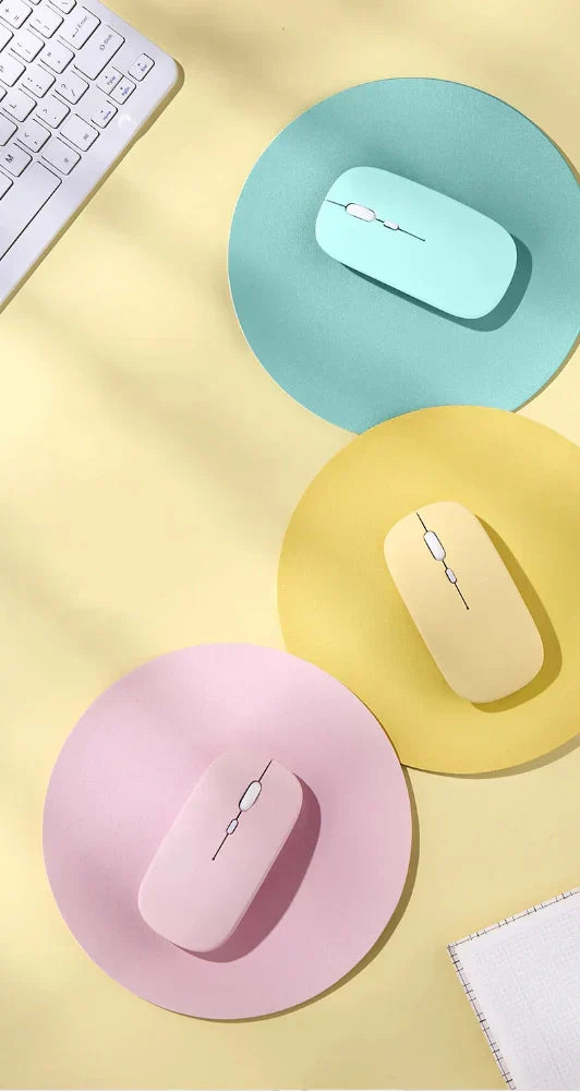 Vibrant Wireless Bluetooth Noiseless Mouse: light pink, white computer mouse, minimal style