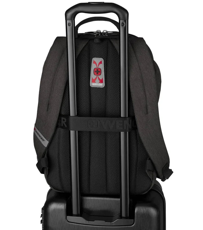 Pass-Thru trolley sleeve slides over the handle of wheeled luggage for easy travel with multiple bags