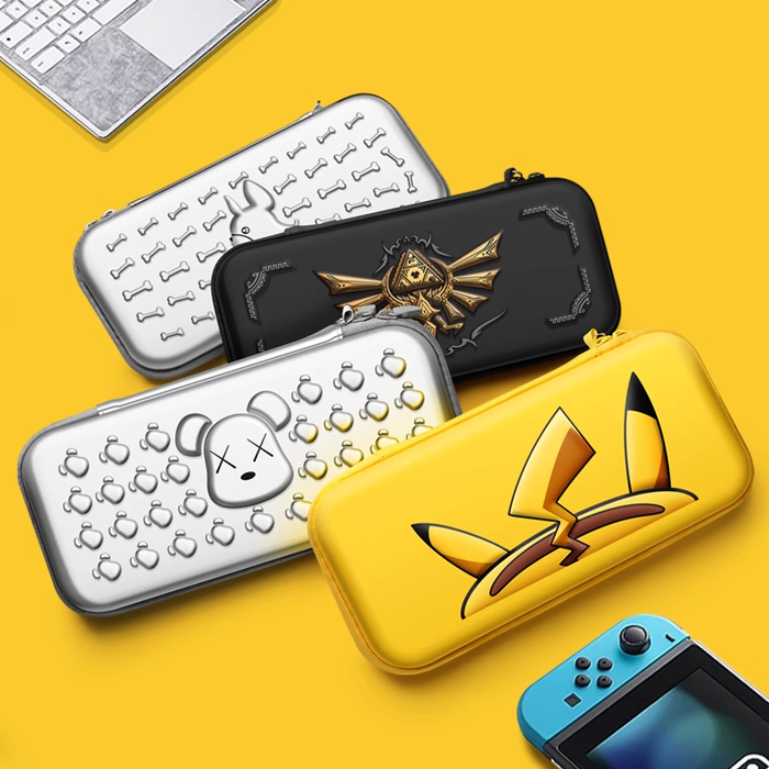 Zelda Switch OLED Carrying Case: black, gold ornate fantasy-style cross emblem, ornate gothic fantasy style
